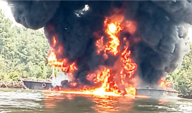 NNPC, Operatives Destroy Barge With Stolen Crude, Filling Station In Delta